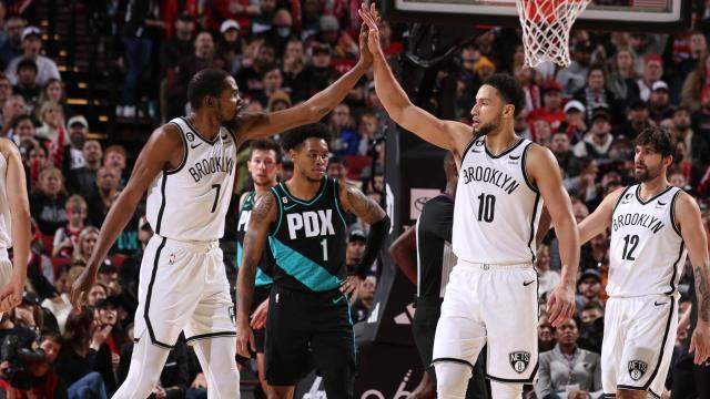 1671779629839025835.jpg Kevin Durant and Ben Simmons 111822.jpg